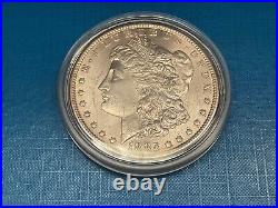 1885o 1oz Silver Morgan Dollar. In Capsule