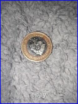 Elisabeth 2nd 1 pound coin print error dark bronze coloured rim