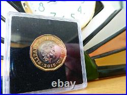 The 2015 £1 Trial Piece Coin + In A Protective Sealed Capsule +